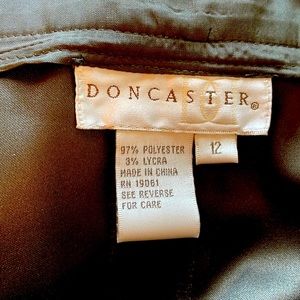 A line olive green.Side zip/button close wide flat waistband multi stitching